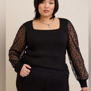 Torrid Black Top with Sheer Polka Dot Sleeves